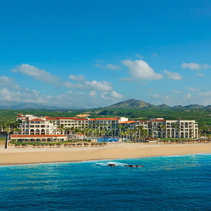 This is a panoramic image of Dreams Los Cabos Suites Golf Resort and Spa