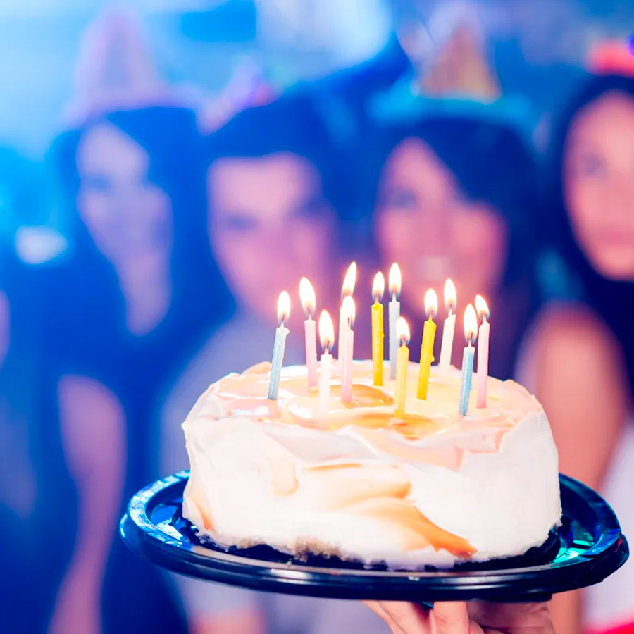 This is an image of people celebrating at a birthday party
