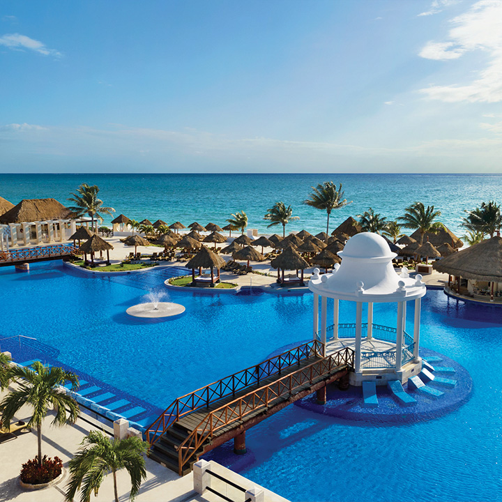 Aerial view of resort, pools, and ocean at Dreams Sapphire