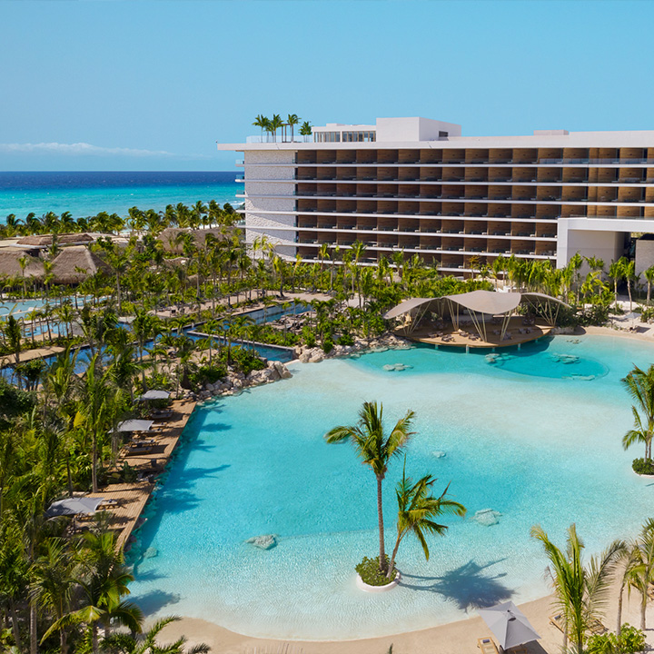 Aerial view of resort exterior and pool at Secrets Moxché Playa Del Carmen